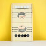 Foosball Winner Board Game real picture sand infront of a wall